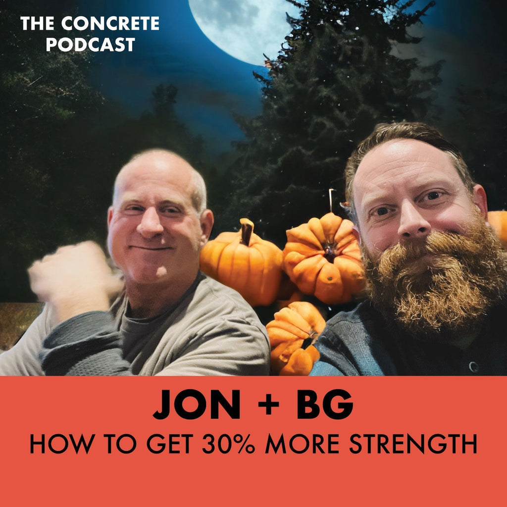 Jon Schuler and Brandon Gore sitting in front of a pumpkin patch