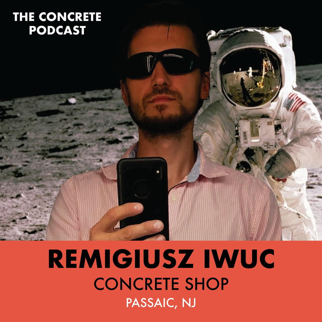 Remigiusz Iwuć of Concrete Shop working on a handcrafted concrete countertop in his solo workshop.